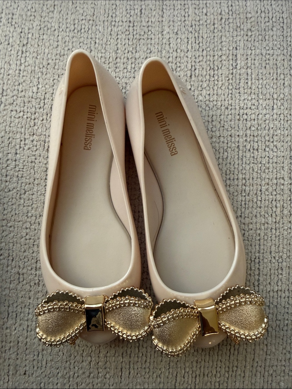 Mini Melissa Pale Pink Ballet Flats with Gold Bow Accent